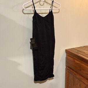 bebe Black Mini Dress with neon yellow lining and accents